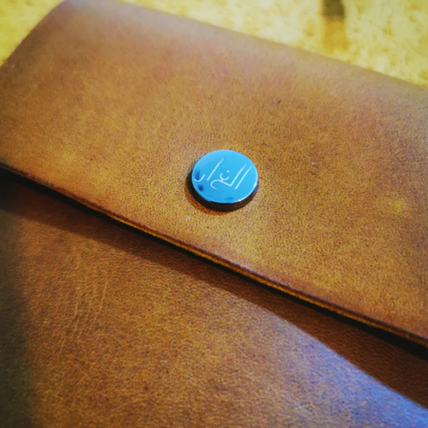 Handmade all-natural leather wallet designed to fit money and cards