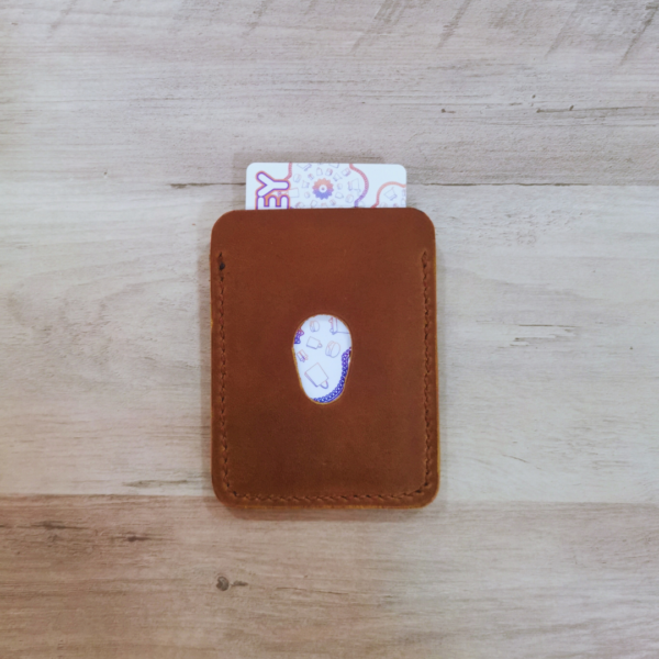 Handmade all-natural leather wallet designed to fit money and cards