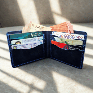 Handmade navy blue crazy horse leather bifold wallet with natural matte finish and minimalist design.