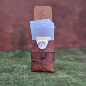 view of a 9x6cm brown textured leather wallet highlighting its intricate vertical cross-stitch pattern.
